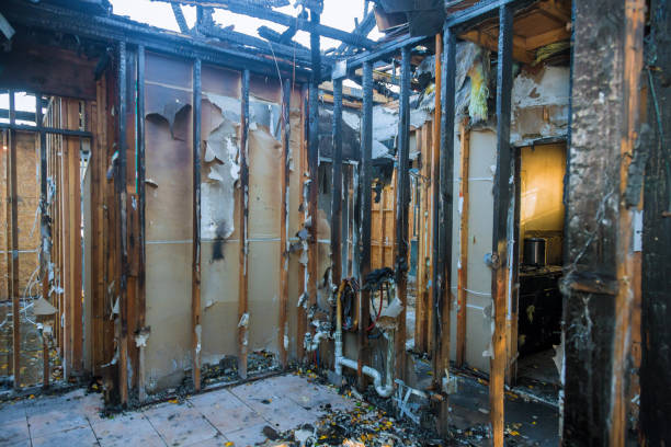 Professional Fire Damage Restoration technician working in Holcomb, KS